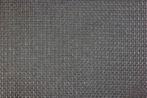 Closeup of grey fabric showing textured weave Stock Photos