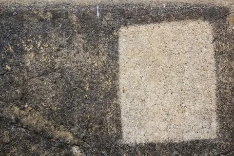 Closeup grey stone texture with white square trace Stock Photos