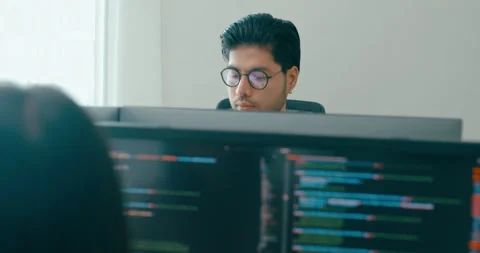 Closeup Group Asia freelance write prompt AI bot app terminal coding in office. Video stock 312184090