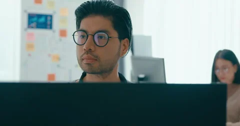 Closeup Group Asia freelance write prompt AI bot app terminal coding in office. Stock Footage 312192384