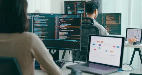 Closeup Group Asia freelance write prompt AI bot app terminal coding in office. Stock Footage 312195778