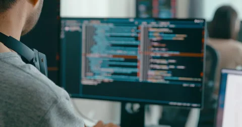 Closeup Group Asia freelance write prompt AI bot app terminal coding in office. Video stock 312195803