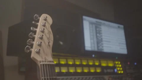 Closeup of Guitar with Equipment in the Background Stock-Footage 278485082