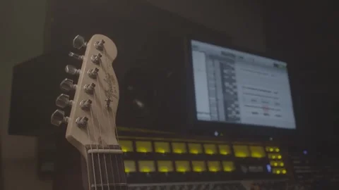 Closeup of Guitar with Equipment in the background Stock Footage 278485083