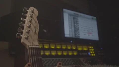 Closeup of Guitar with Equipment in Background Stock Footage 278485084