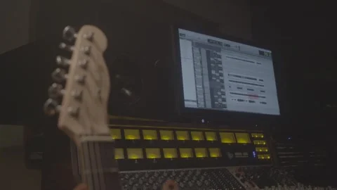 Closeup of Guitar with  Equipment in the Background Video stock 278485086