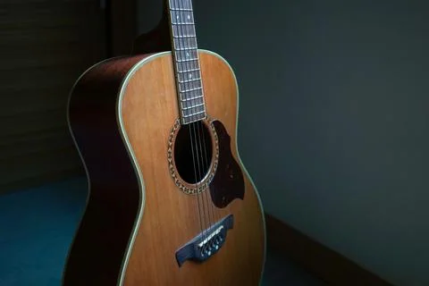 Closeup guitar with light from window 스톡 사진