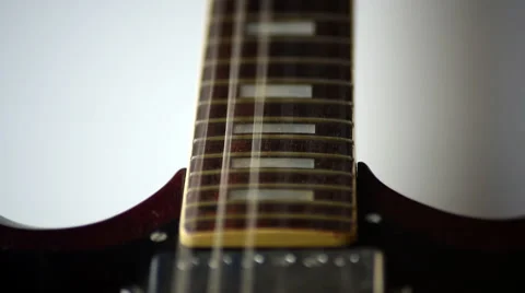 Closeup Guitar Strings Strum Loop 動画素材 67608122