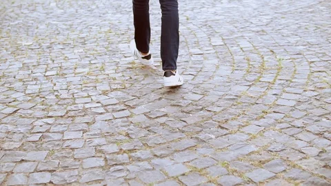 Closeup guy going on sidewalk Stock Footage 99866063