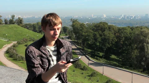 Closeup Guy Reads Electronic Book Then Leaves 動画素材 39145234