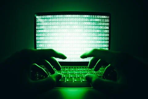 Closeup of hacker is using the laptop computer to coding virus or malware f.. Stock Photos