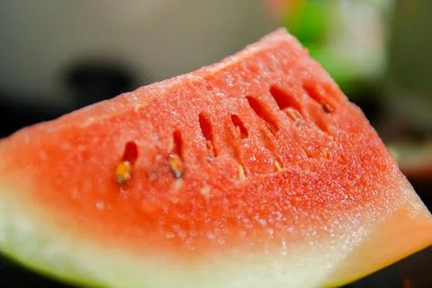 Closeup. Half cut of watermelon on the table Stock Photos