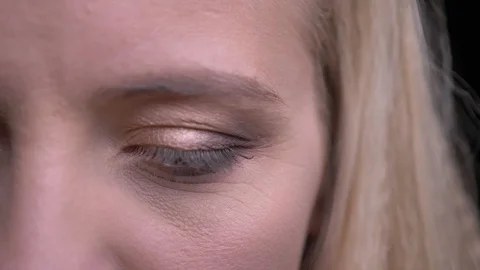 Closeup half-face portrait of young beautiful caucasian female with gray eyes Stock Footage 103622401