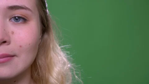 Closeup half face shoot of young attractive caucasian female face with eyes Stock Footage 108677153