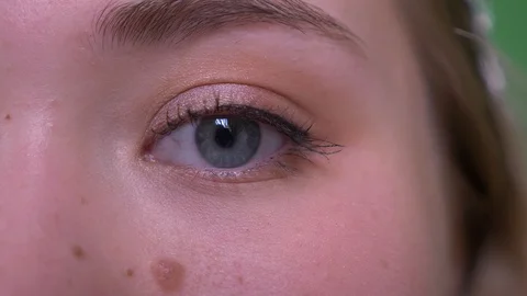 Closeup half face shoot of young attractive caucasian female face with eyes Stock Footage 108677750