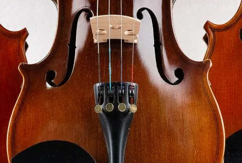 Closeup half front side of violin put on background,show detail and part of v 스톡 사진