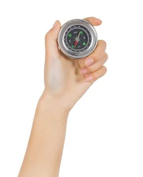 Closeup hand and compass Stock Photos