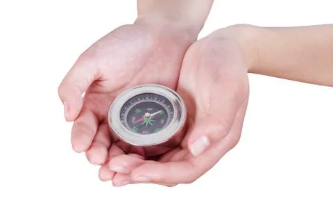 Closeup hand and compass Stock Photos