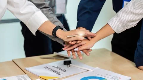 Closeup hand of Businesspeople unity between business people with their hands Foto stock