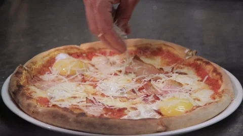 Closeup hand of chef baker making pizza at kitchen Stock Footage 90284235
