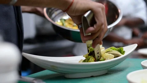 CloseUp Of Hand, Chef Is Putting Fruit Mix  Salad Into A Plate, Stock Footage 89989951