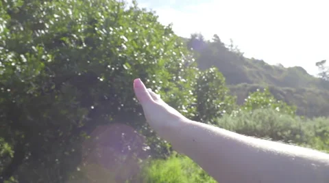 Closeup Of Hand Feeling The Breeze, Outside Of Car (Lens Flare, Slow Motion) Stock-Footage 47260058