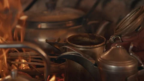 Closeup of Hand Grounded Coffee put in a Finjan Video stock 270344363