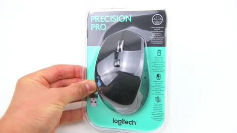 Closeup hand holding Precision pro m720 Logitech wireless bluetooth mouse Stock Footage 203854565