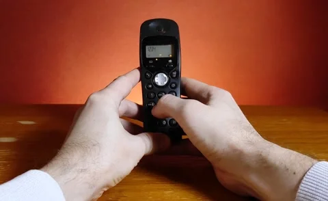 Closeup hand making a call composing numbers on keyboard telephone. Stock-Footage 147682464