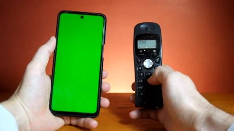 Closeup hand making a call composing numbers on keyboard telephone. Stock-Footage 147740467