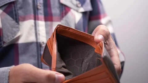 Closeup hand man open an Empty Wallet because he lost money poor finance debt Stock Footage 336450566