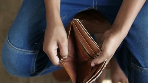 Closeup hand man open an Empty Wallet because he lost money poor finance debt Video stock 336450579