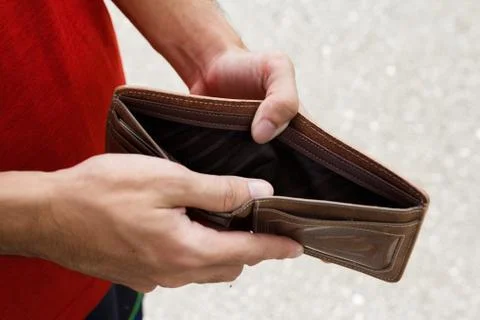 A Closeup hand man open an Empty Wallet. Stock Photos