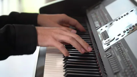 Closeup hand man playing piano Stock Footage 242988475