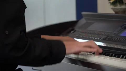 Closeup hand man playing piano Stock Footage 242997655