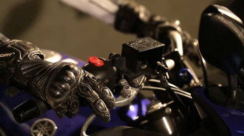 Closeup of the Hand of motorcyclist Stock Footage 57530182