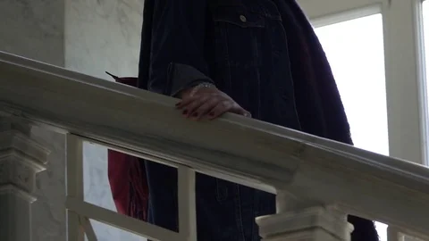 Closeup of Hand Moving Along Banister Stock Footage 80360968