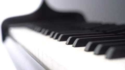 Closeup hand playing chords and notes on grand piano Stock Footage 108901749