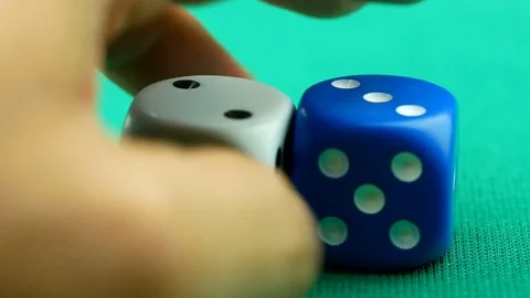Closeup hand playing with dice Stock Footage 81855606