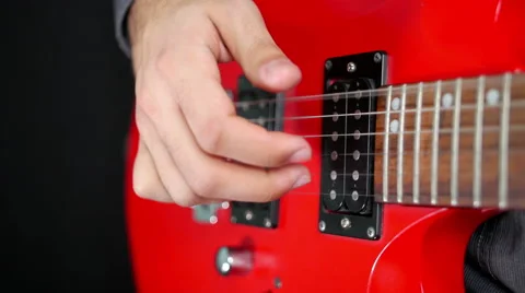 Closeup of a Hand Playing Guitar Stock-Footage 62346870