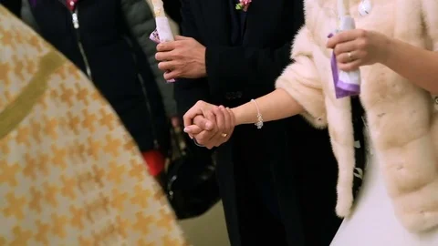 Closeup hand of the priest in the background Bride Stock Footage 85291179