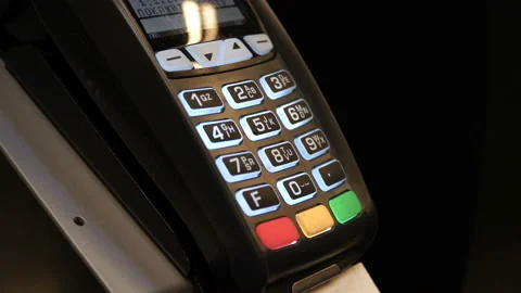 Closeup hand pushing the button and pay with contactless credit card at store Stock Footage 86888931