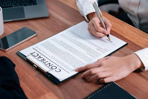 Closeup hand signing contract document with pen. Enthusiastic. Stock Photos