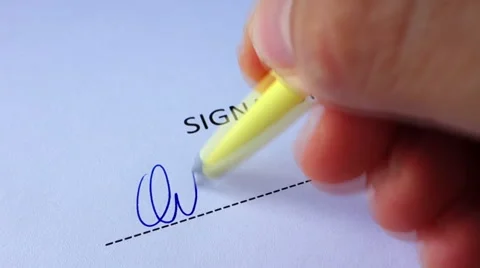 Closeup of hand signing Stock Footage 59773306
