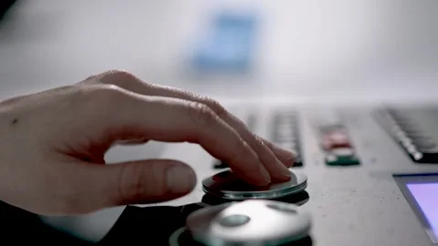 Closeup of Hand on Studio Mixing Console Fader Controls Stock Footage 340243069