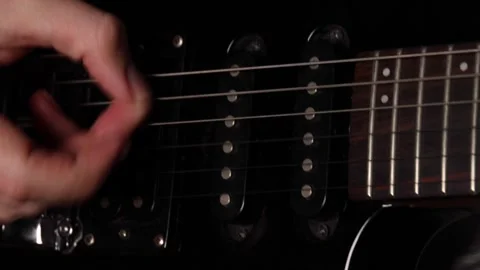 Closeup of hand touching instrument strings with precision, instrument soun.. Video stock 320734569