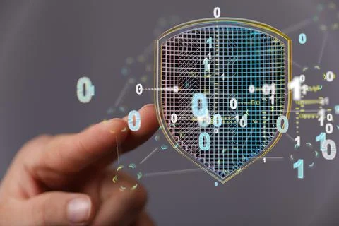 Closeup of the hand touching the virtual shield with binary numbers. 写真素材