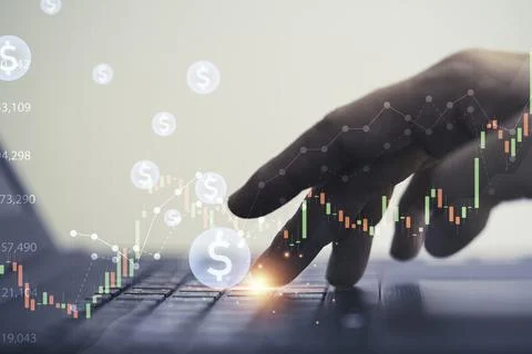 Closeup hand using laptop computer with usd dollar sign and technical inves.. Stock Photos