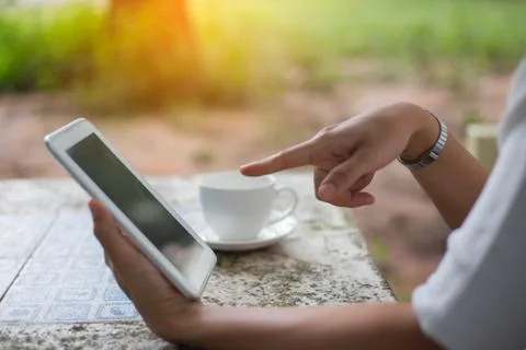 Closeup of hand using smartphone with effects Foto stock