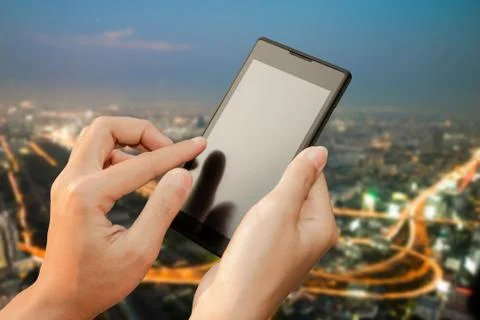 Closeup hand using smartphone mobile Stock Photos